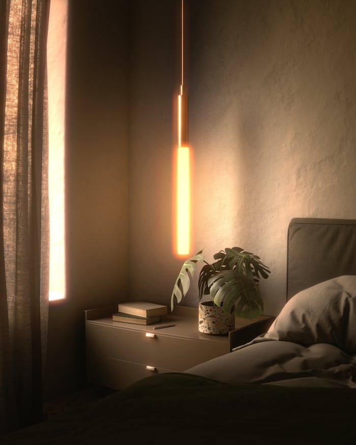 hero-img-01 A minimalist bedroom corner featuring warm lighting and a touch of greenery.